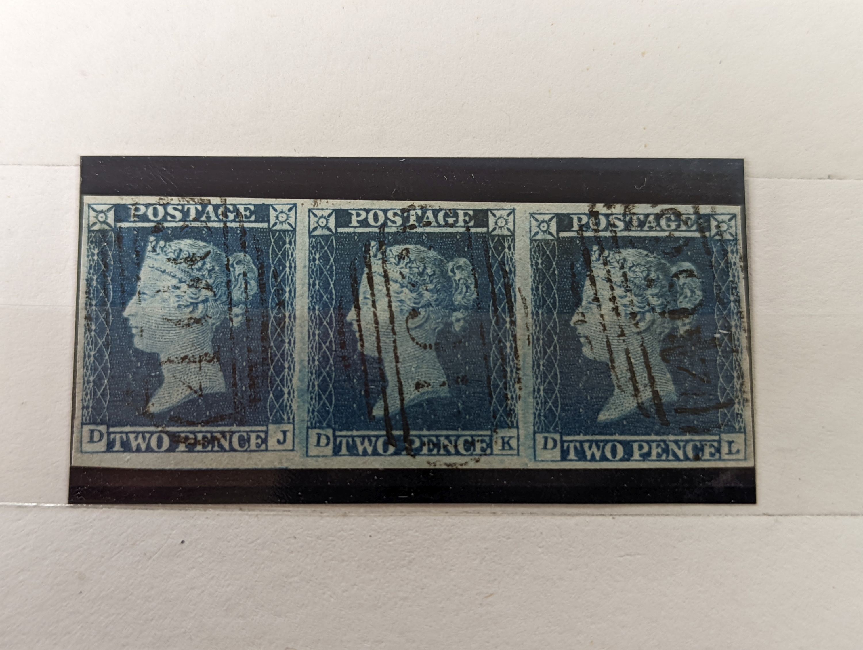 Great Britain - small stock book 2d blues with 1841 2d used strip of three, 6 singles used. 1858 2d plate 13 and plate 14 mint blocks of four
